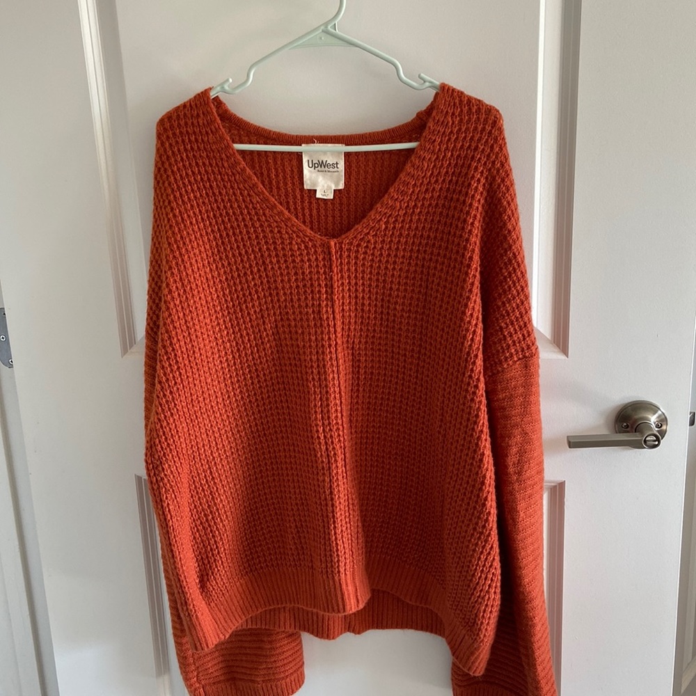Burnt orange sweater from UpWest. Size large but fits more like XL